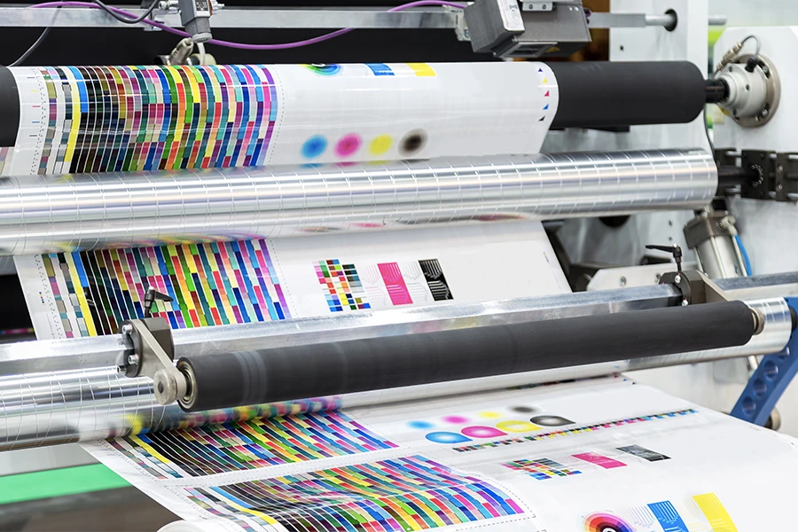 Offset press running color-controlled book sheets for a hardcover print run