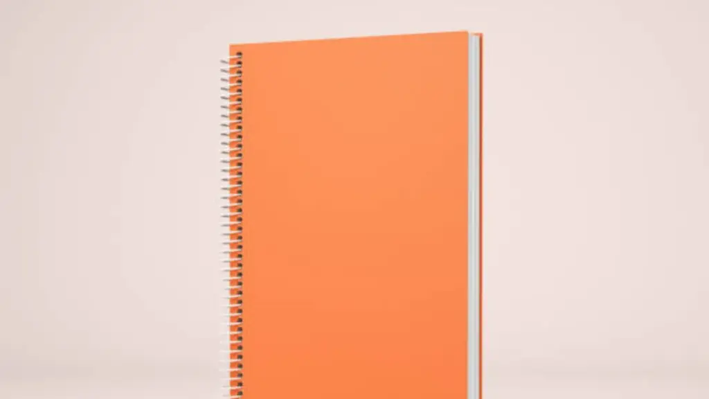 a orange spiral notebook
