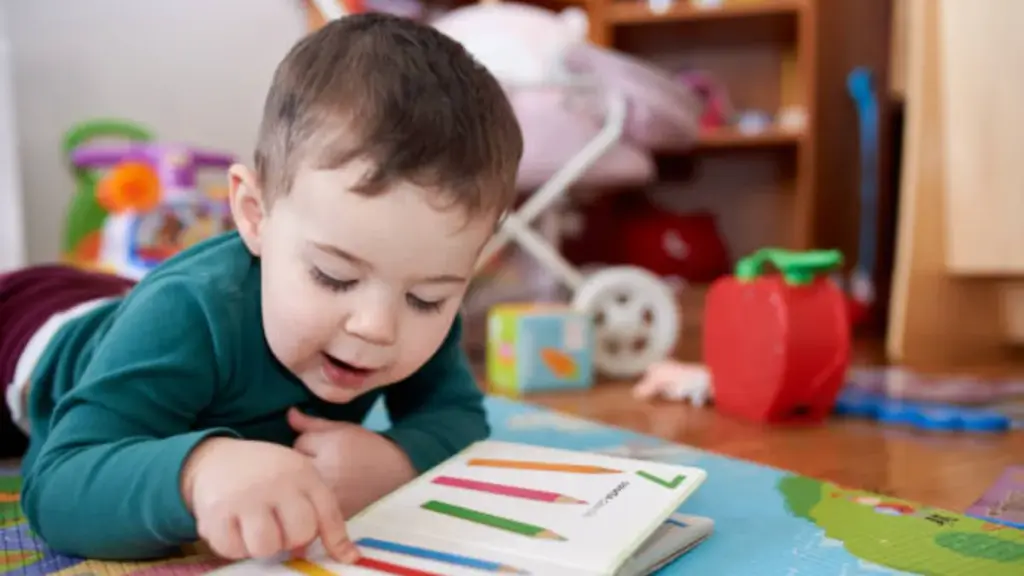 baby reading the board book