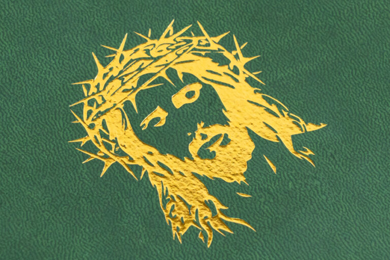 Gold foil stamping on a green embossed PU cover surface